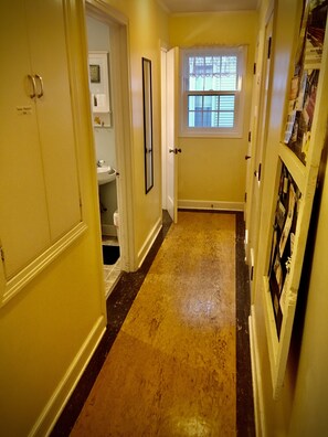 Hallway to bath and half bath