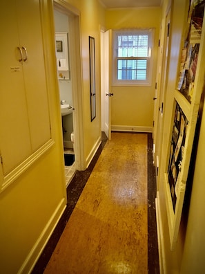 Hallway to bath and half bath