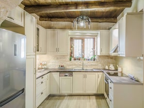 Fully equipped kitchen at the ground floor.