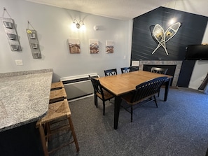 Dining area next to kitchen & living room