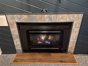 Gas fireplace in living room / dining room area