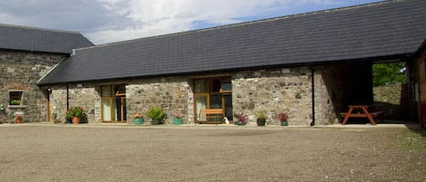 historic buildings in a quiet rural courtyard.