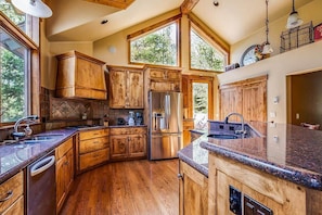 Kitchen with access to the outdoor patio