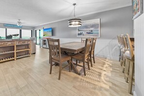 Seating for 6 at the dining room table with 4 bonus bar stools for additional seating