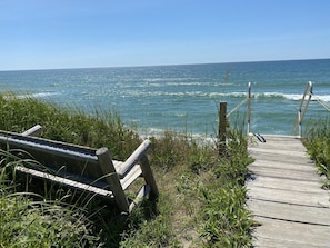 Our private steps to the beach - 110 feet from our house - with bench for views