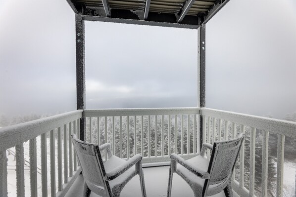Relax & soak in the snowy scenery from your private outdoor space.  Guest Review from Jeremy Roh: "The location couldn’t be better—just steps away from ski rentals & the slopes. The ski equipment storage was really convenient. Spacious for a family of 5!"