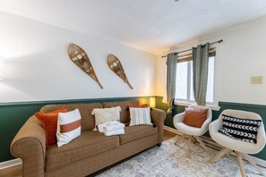 Relax and unwind in this cozy living room with comfortable seating.