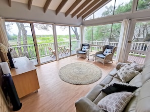 Living Area with views over the wetlands and to the beach.