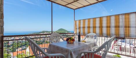 Large terrace with a wonderful view of the city panorama and the Adriatic Sea 