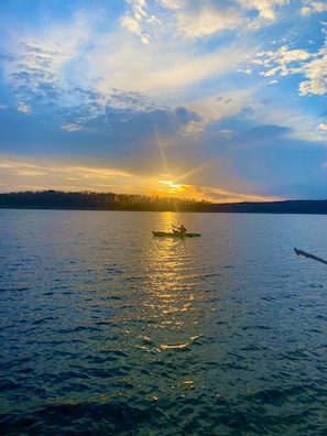 Kayak at sunset from the private cove. 