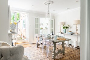 Tide Cottage, Overstrand; Bright dining room opens into the garden