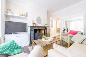 Tide Cottage, Overstrand; Fresh inviting sitting room with wood burning stove