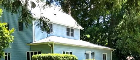 Front of House with Paved Driveway Parking