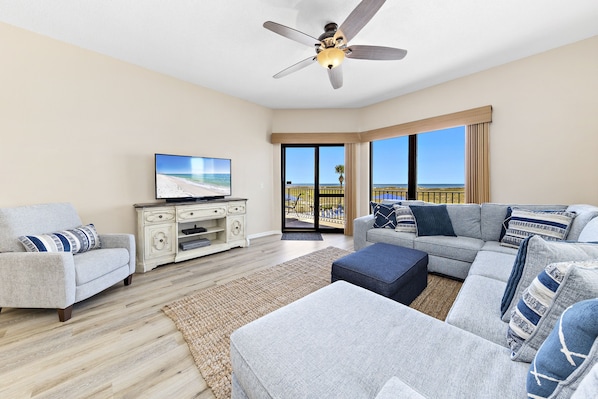 Newly updated spacious Living Room with Plenty of comfortable seating and Beachfront Private Balcony