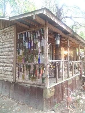 Cool Wine Bottle Wall on one side of the porch!