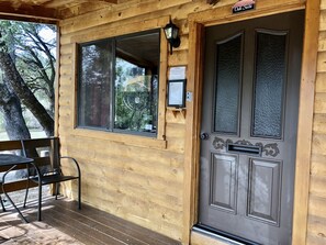 Front door with covered patio