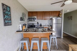 Welcome to Mountain Lodge 122, featuring a modern kitchen island and great views of Ballhooter lift.