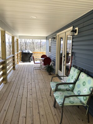 The porch.  The double doors are the main entry into the house.