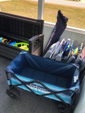 6 Beach chairs, umbrella, kids toys and a cart to help get it all to the beach.