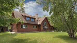 Lake side yard. Plenty of space for lawn games and relaxing