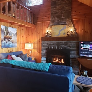 Family room w/propane fireplace,50inchTV, couch &loveseat, & recliner(not shown)