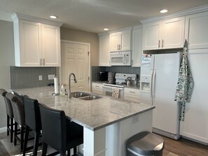 New Kitchen with custom cabinets and tile.