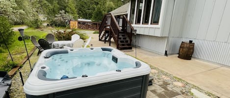 Enjoy soaking in our BRAND NEW HOT TUB and watching the sunset 