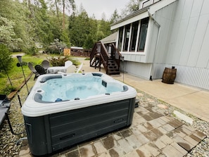Enjoy soaking in our BRAND NEW HOT TUB and watching the sunset