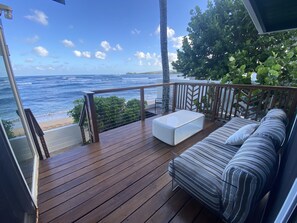 Outdoor lounge with views of the Haleiwa Harbor. Your new happy place. 