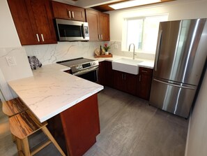Full Kitchen with New Stainless Steel Appliances.