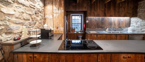 The kitchen with barn wood cabinets