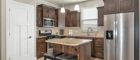 Fully stocked gourmet kitchen featuring all the comforts of home