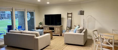 Living and Dining Area (view to pool through windows)