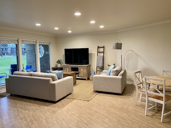 Living and Dining Area (view to pool through windows)