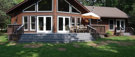 New windows, doors, re-built deck, enjoy the west facing lakeside view