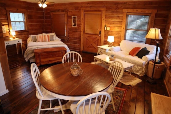 Living/Dining/Bedroom studio apartment-log cabin style. 