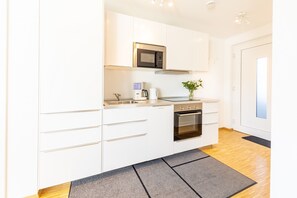 H10 Ferienwohnung, 55qm, Dachterrasse, 1 Schlafzimmer, max. 4 Personen-Küche