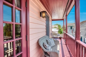 Go back in time as you sit from this balcony taking in the sights of the historic district.