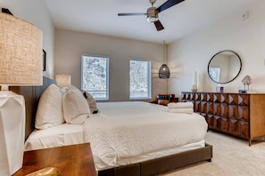 The master bedroom is modern with a generous dash of sunshine.