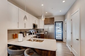 Fully Stocked Kitchen.