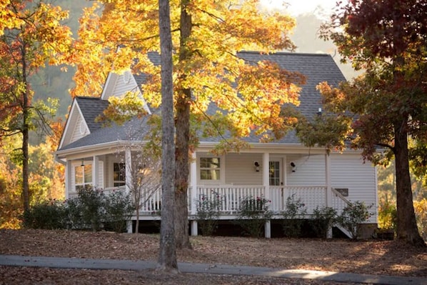 The White Farmhouse Cottage in fall