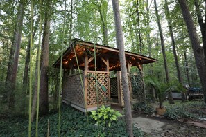 Hot tub seats 4 adults w/ a full privacy fence & is solely for staying guests.