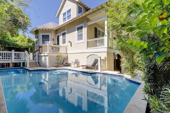 Step outside to your own private oasis featuring a heated pool, perfect for year-round relaxation. The spacious outdoor deck is ideal for lounging, dining, or enjoying the fresh air, and the propane grill makes it easy to cook up a delicious meal. Whether you're soaking in the sun, hosting a barbecue, or taking a dip in the pool, this outdoor space offers everything you need for a perfect getaway