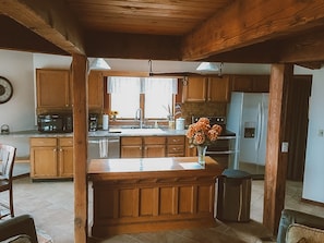 kitchen, counter top and island, also have outdoor cooking area