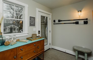 Entry foyer area with guest book to sign and coat closet to store coats & boots!