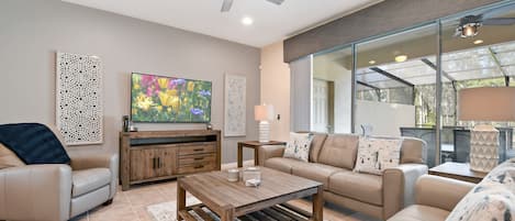 Lavish living room area with flat screen TV
