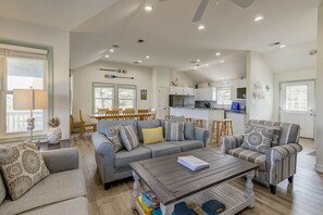 Top-Level Living Room with Deck Access