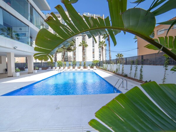 Water, Plant, Property, Sky, Swimming Pool, Window, Azure, Building, Shade, Tree