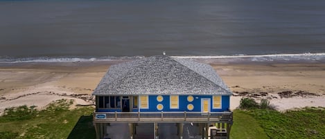 Marvel at stunning panoramic views stretching down the beach toward Galveston. Whether it's a vibrant sunrise or a colorful sunset, every moment here feels magical.