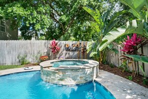 Enjoy this gorgeous private oasis! Lounge chairs and umbrella NOT provided. Non-heated pool. Jacuzzi IS heated!